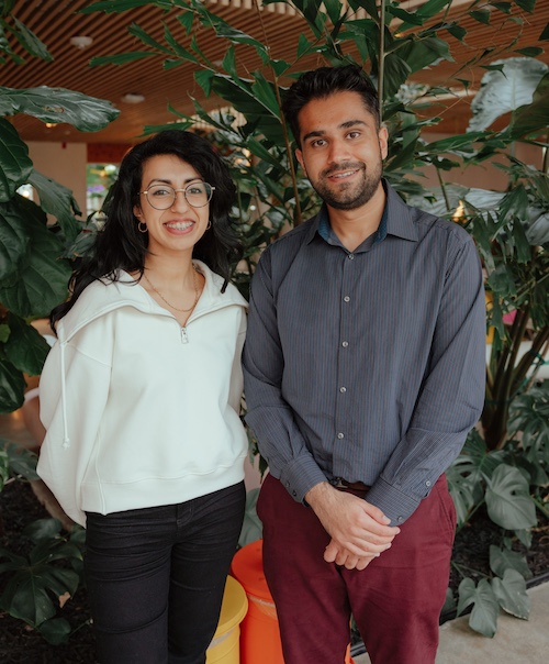 A photo of Pillars Artist Fellows Myriam Raja and Karim Khan smiling together